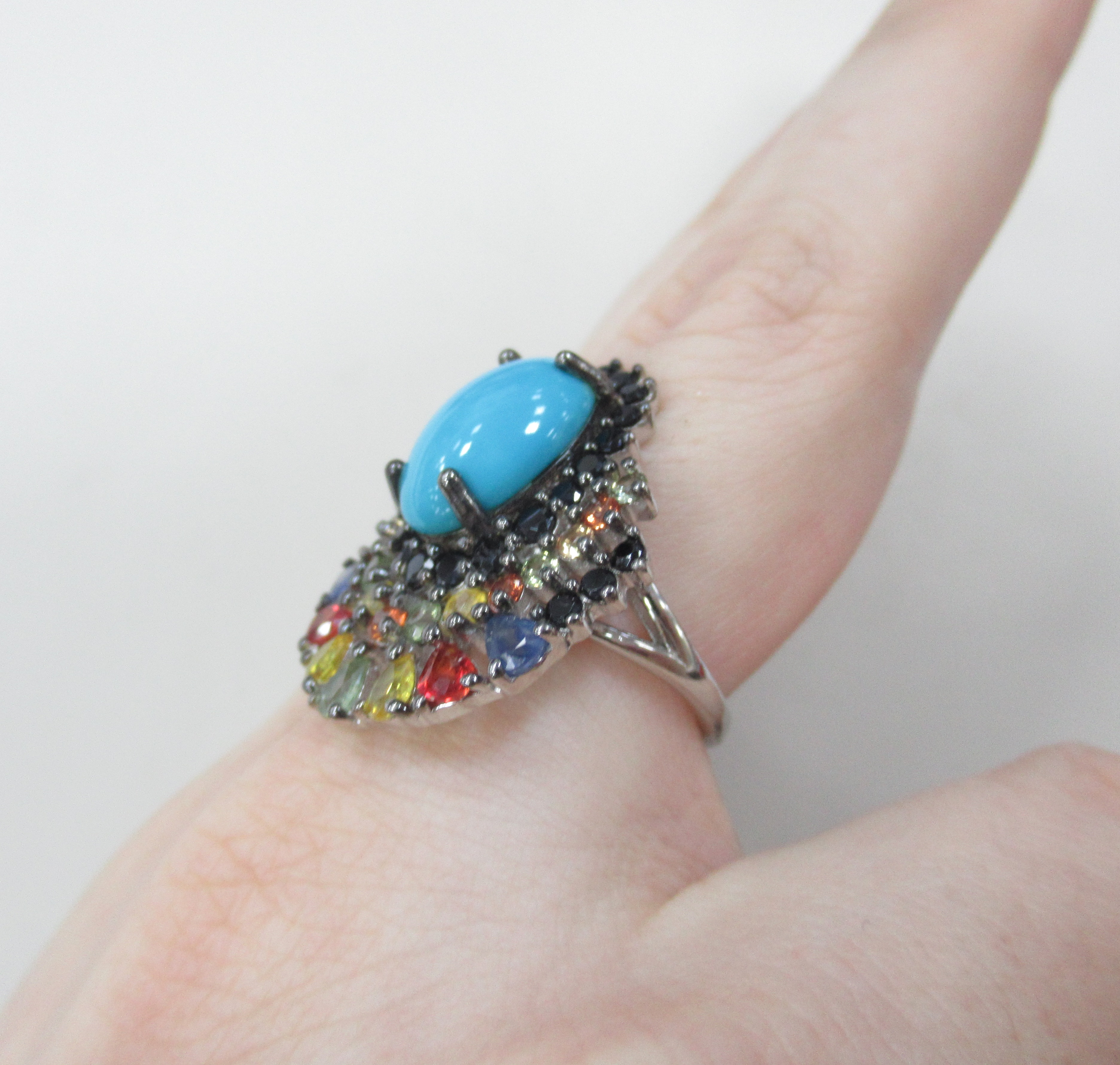 Серебряное кольцо с бирюзой и мультисапфирами